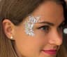 Young woman with glitter makeup on the face at a corporate event in Abu Dhabi